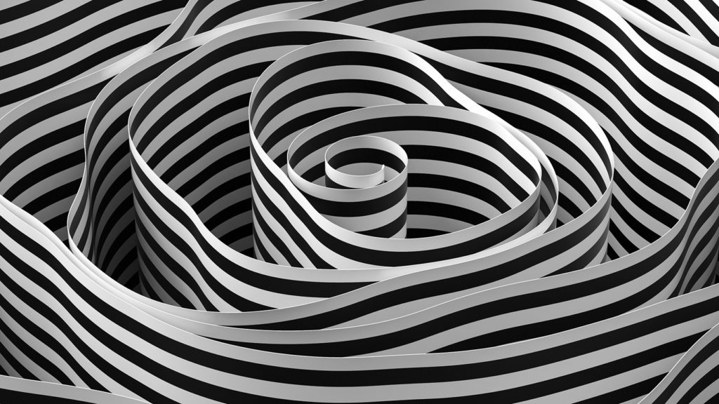 Bande enroulée de couleur noire et blanche qui donne l'impression de labyrinthe